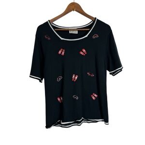 Black Knit Top with Red Embroidery Flip Flops Sunglasses